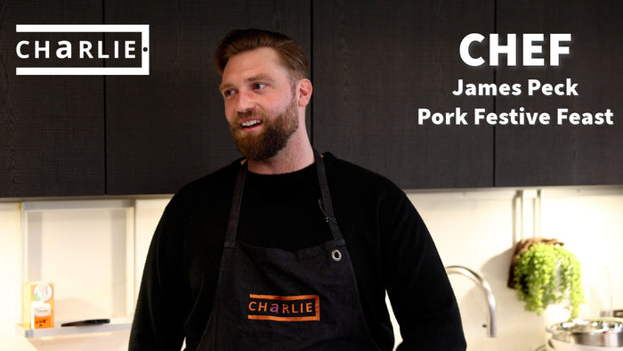 Chef James Peck in a Charlie Oven apron