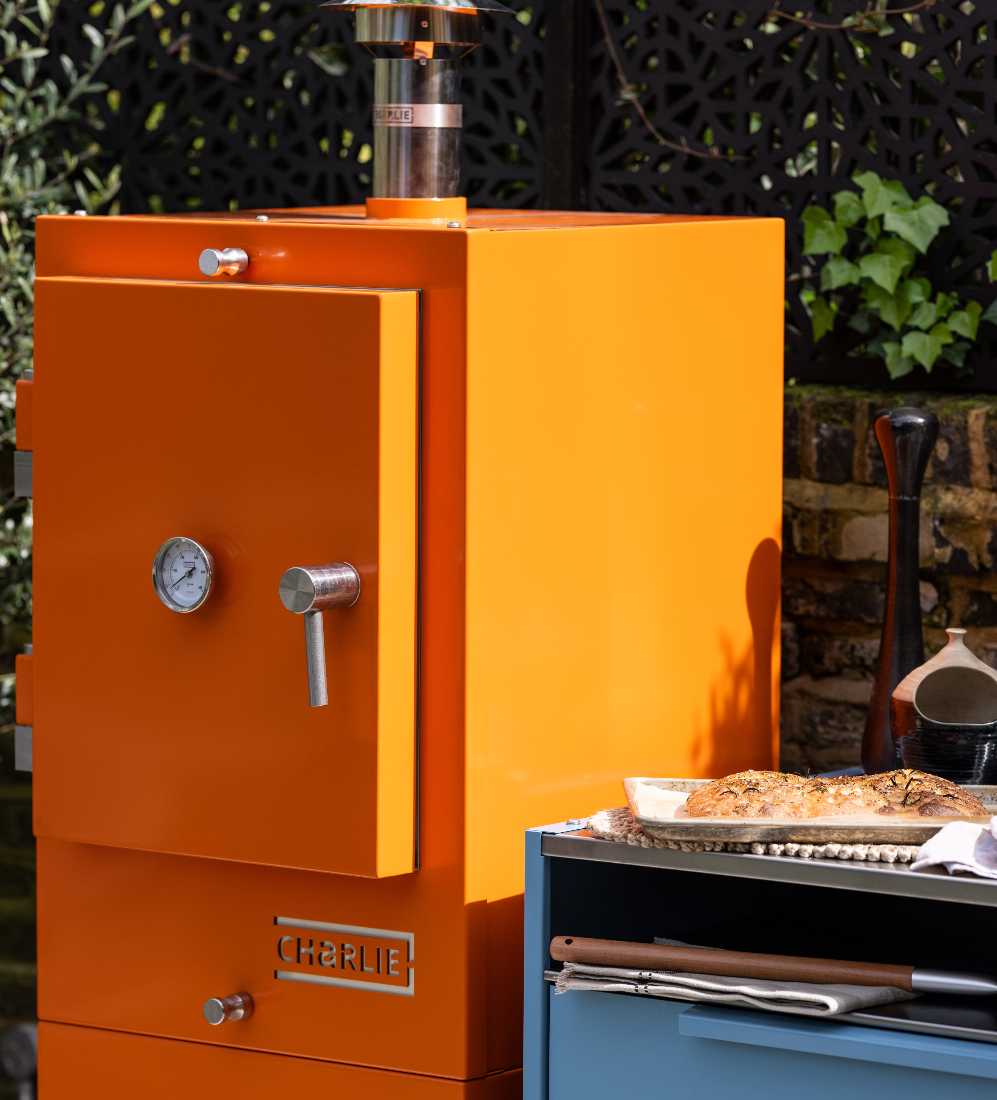 A saffron charlie oven and blue marlin kitchen cabinet in the sunshine
