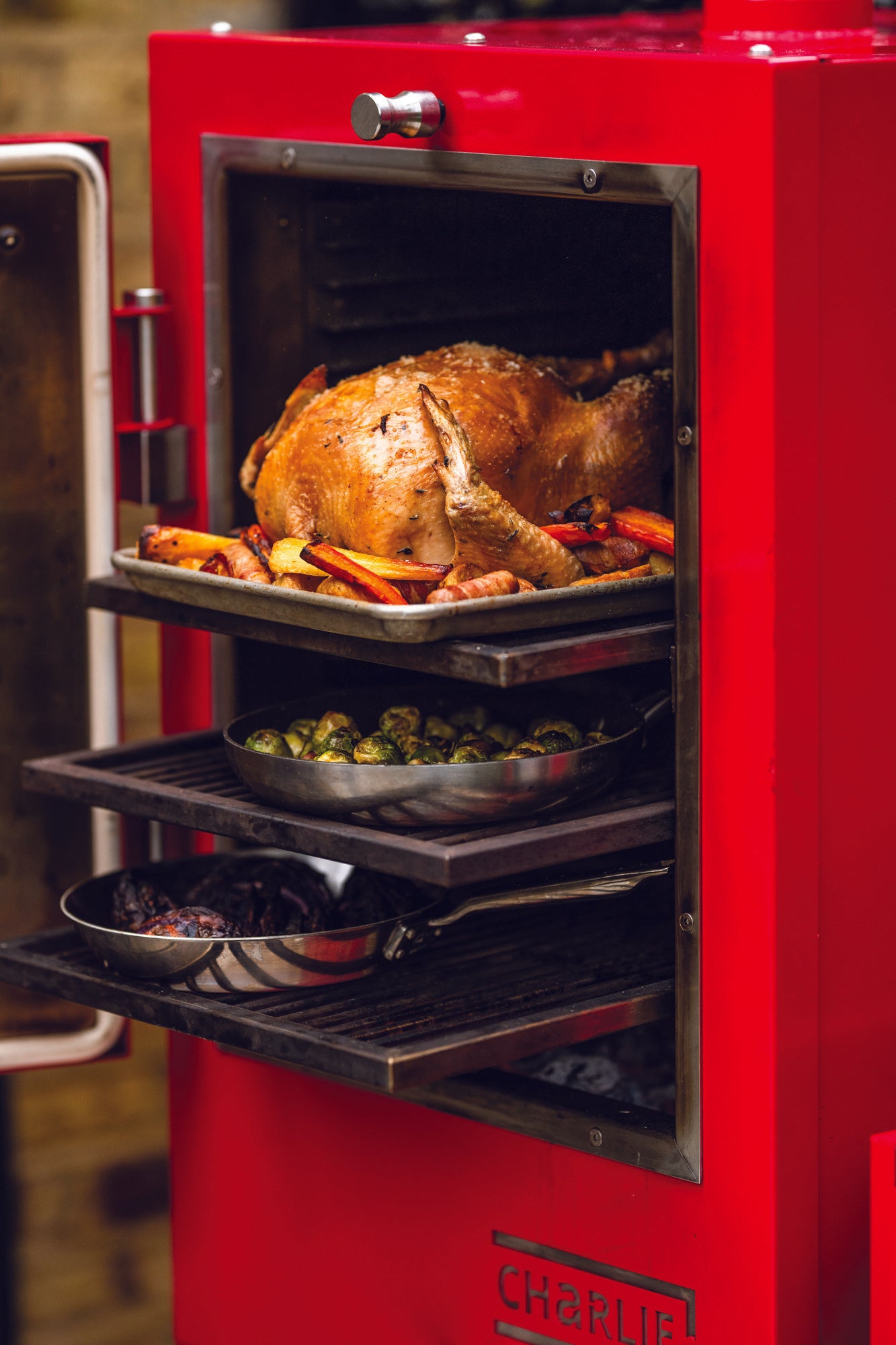 Cooking on multiple levels in the Charlie Oven BBQ