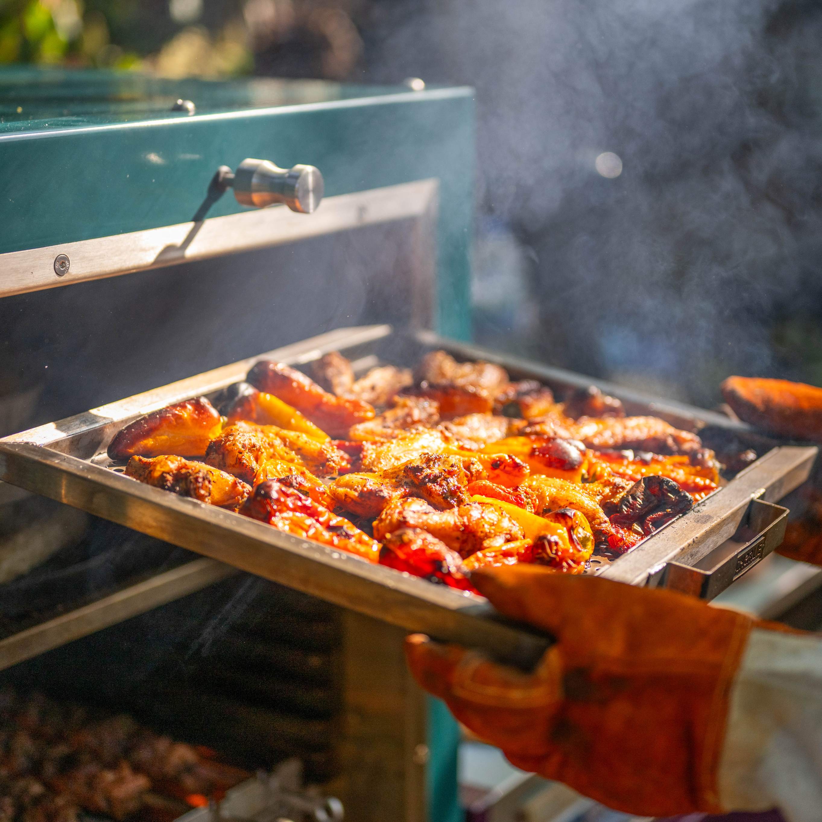 Charlie Oven dual pizza oven smoker with woodchip flavour