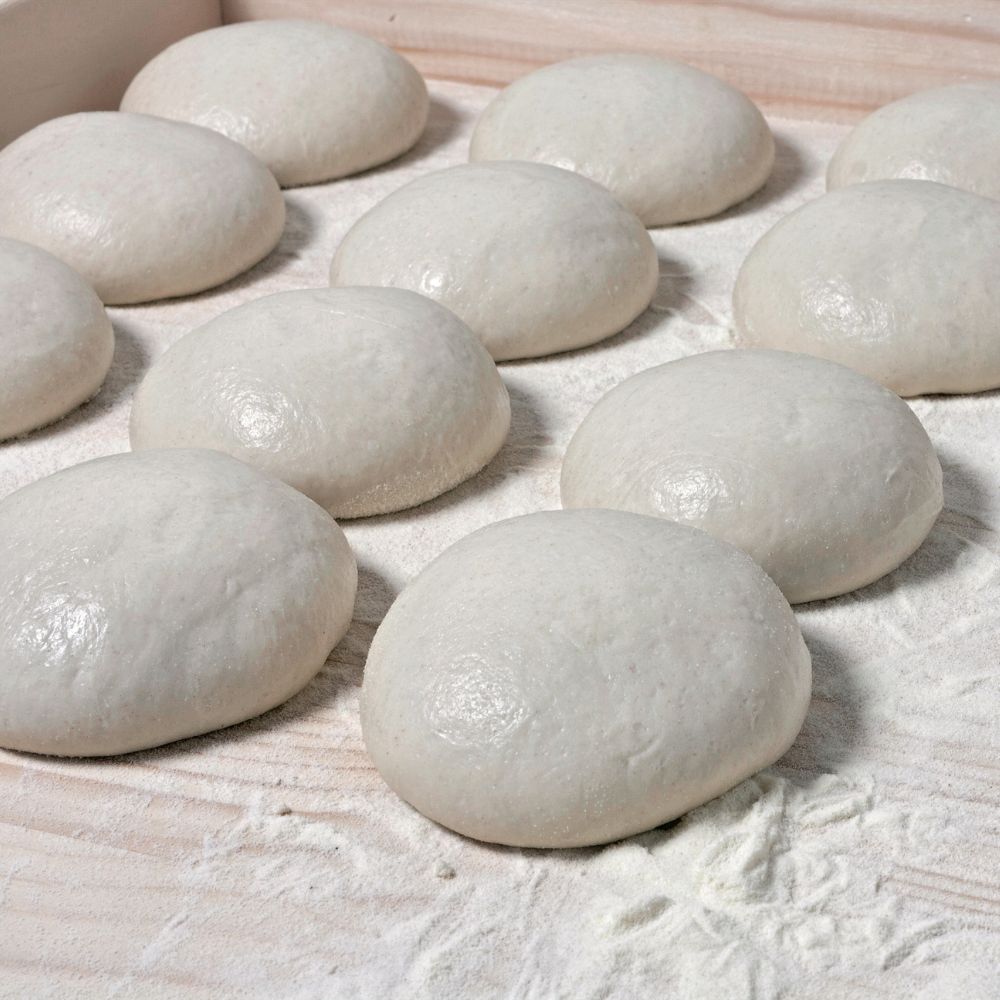 frozen pizza dough balls to make pizza making easy by the pizza dough company 12 or 24 balls. Defrost before use.