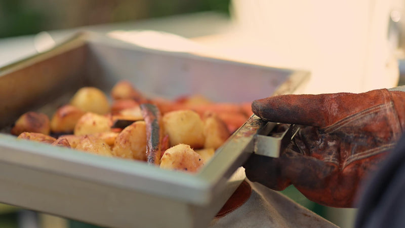 Golden roast potatoes and carrots in the Deep Roasting Tray Rack