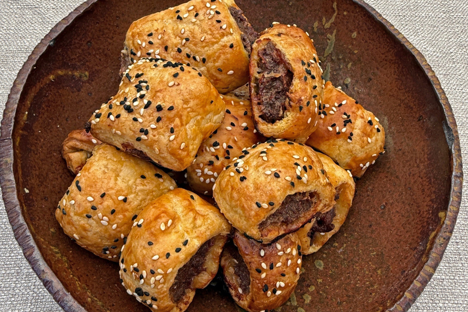 SPICED BAHARAT SAUSAGE ROLLS