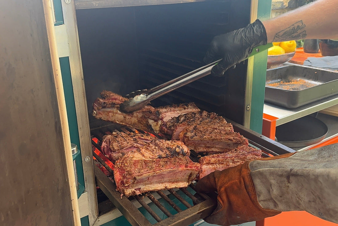 Beef short ribs seared over charcoal before slow cooking with stout and black treacle