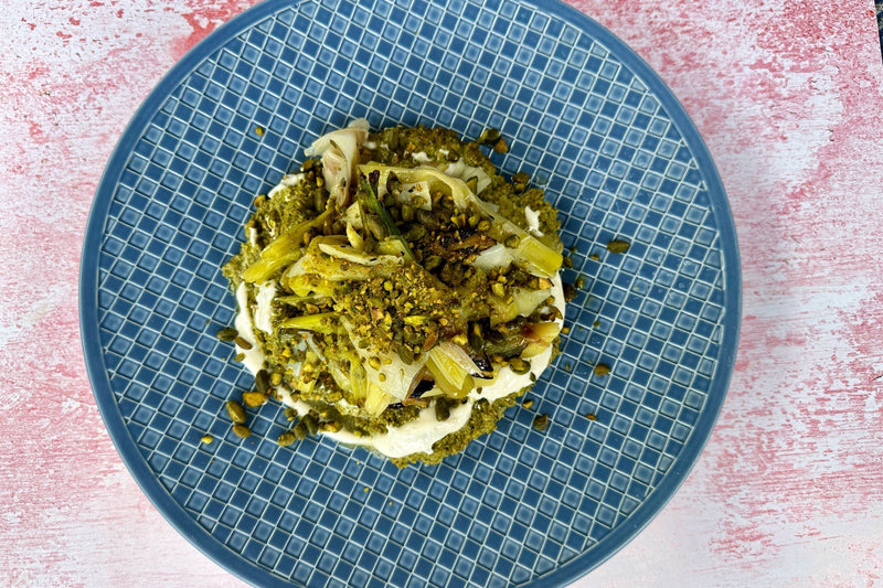 Chargrilled Leeks with Pistachio Romesco Sauce by Chef Andrew Clarke