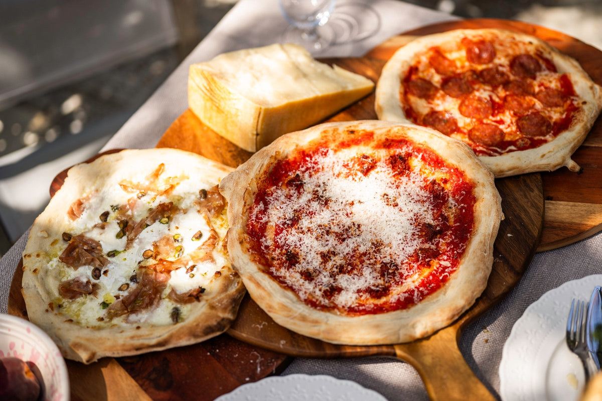 Three pizzas baked together in the Charlie Oven