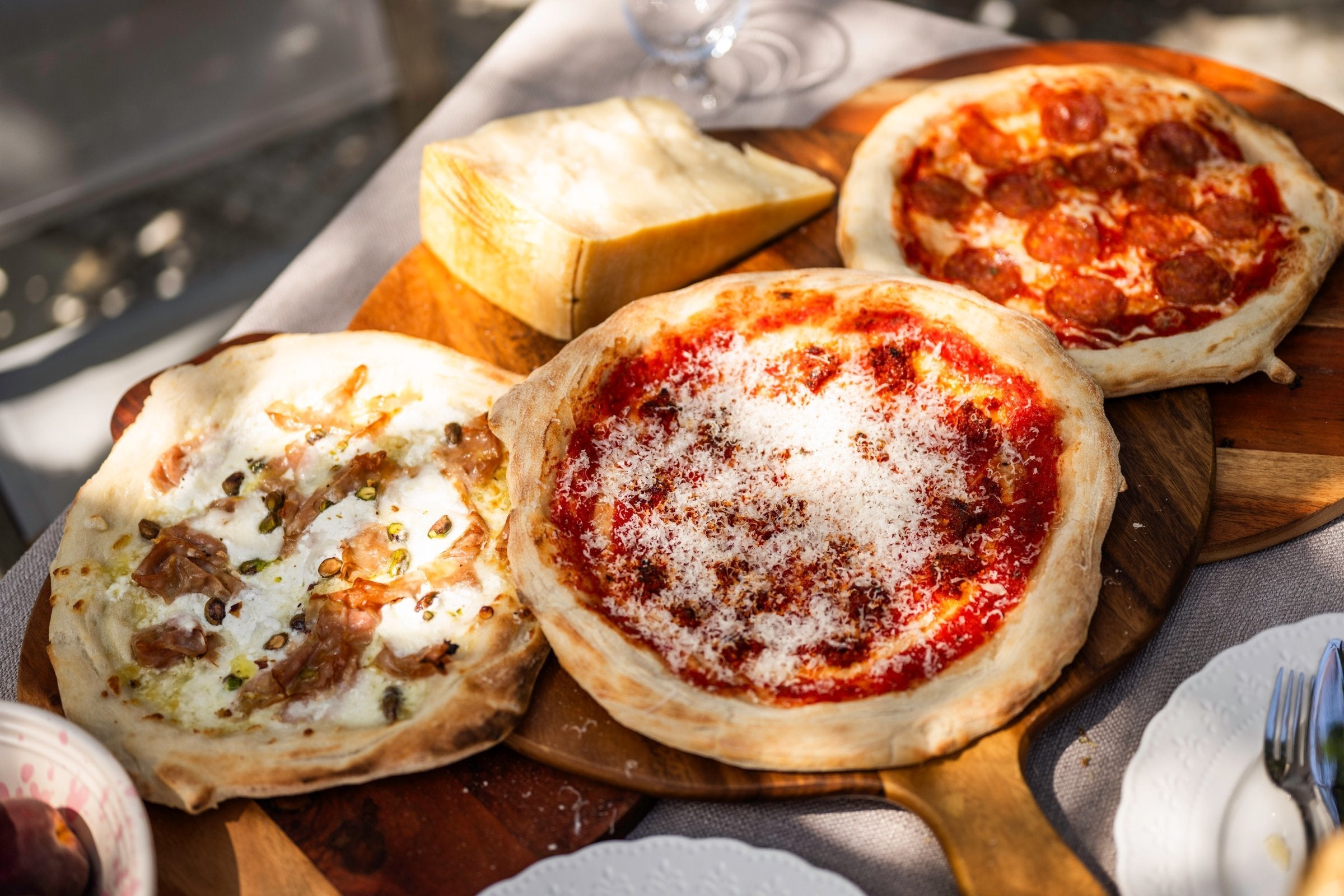 Three pizzas baked together in the Charlie Oven