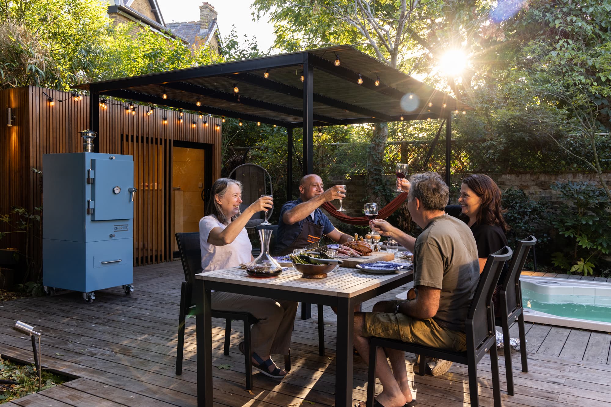 Charlie Charcoal Oven in Blue Marlin - the perfect way to cook a whole meal outside to share with friends