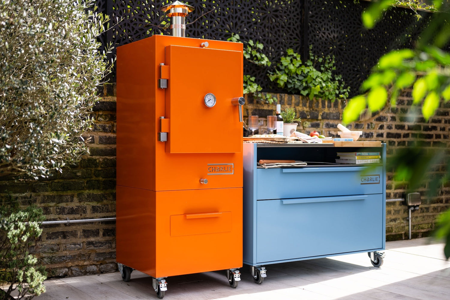 Charlie Charcoal Oven in an outdoor kitchen, lifestyle view