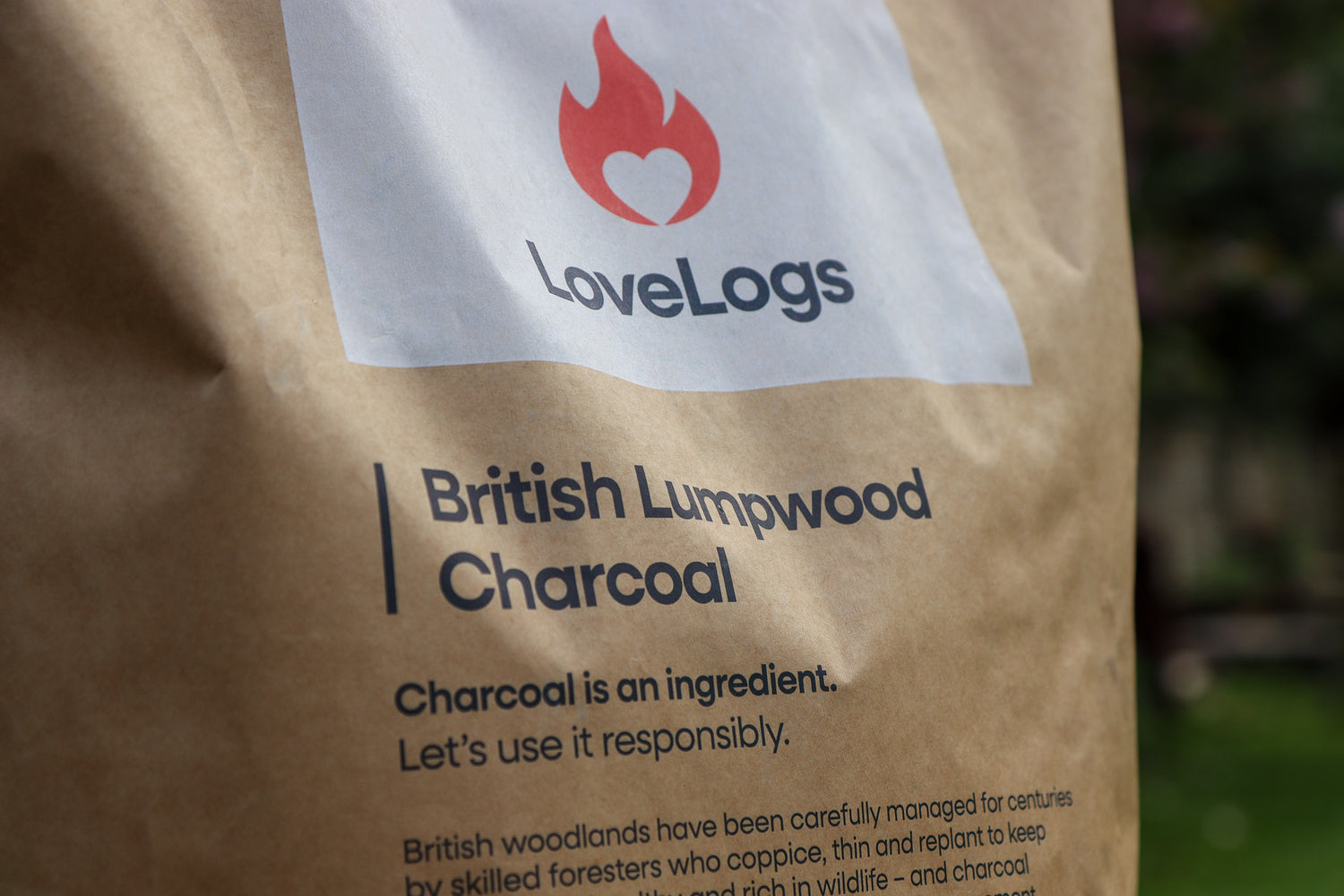 Back of the Love Logs British cherrywood charcoal bag showing product details