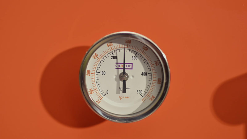 The door thermometer on a Saffron Charlie Oven reading 250°C