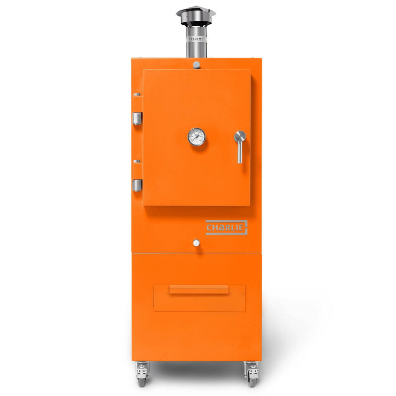 Charlie Charcoal Oven in saffron yellow, front view on a white background