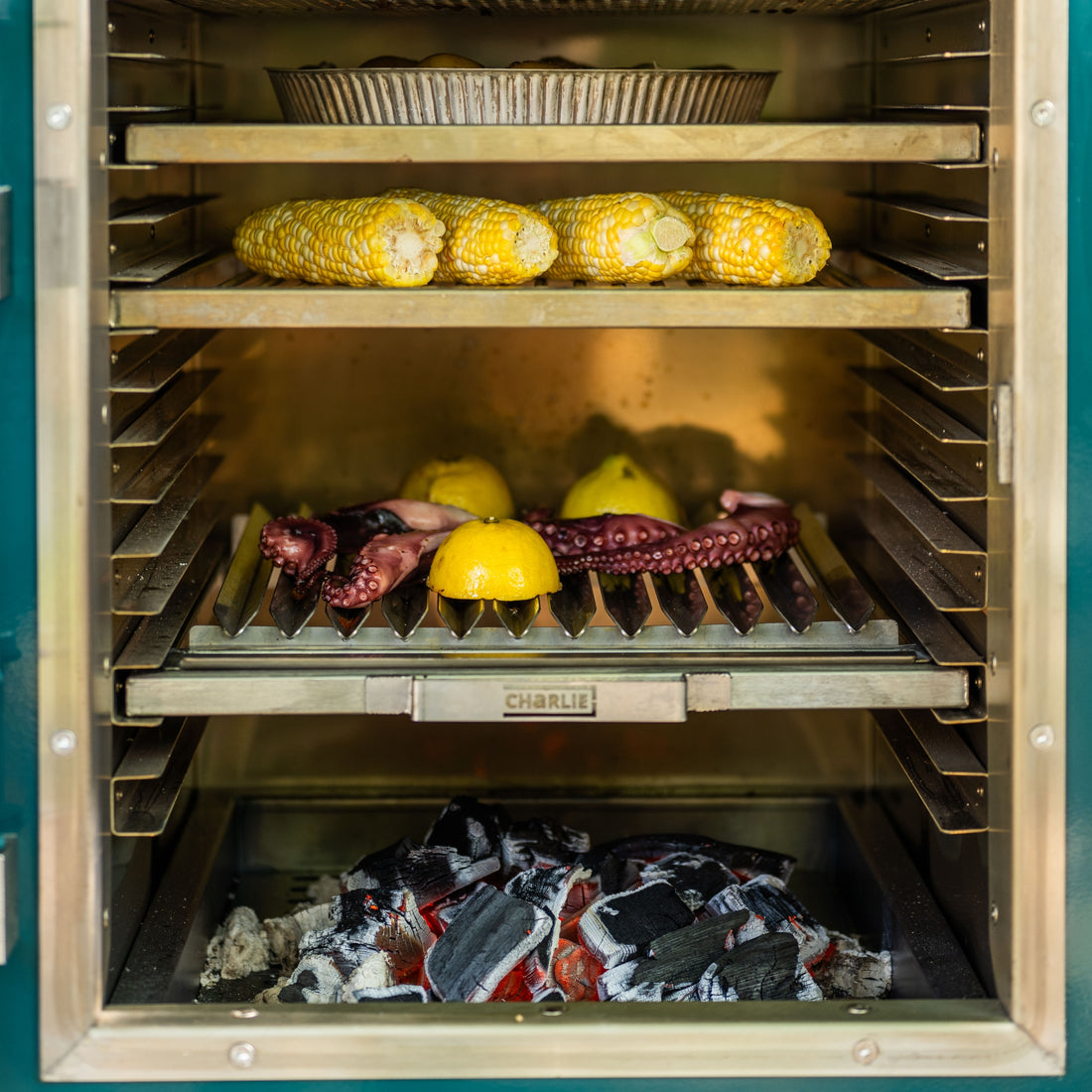 Parrilla argentine grill rack grilling squid in the charlie oven