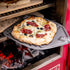 Pizzas coming out of the charlie oven cooking on several levels at once