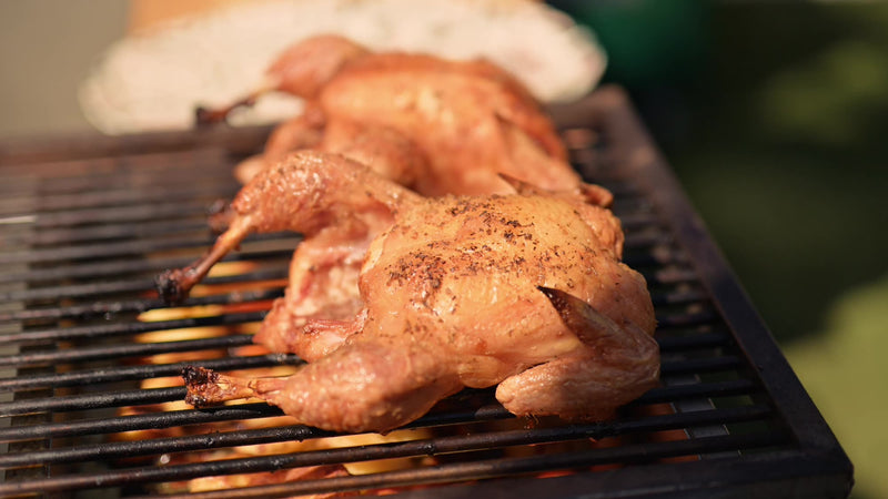 Spatchcocked roast chickens on a Charlie cooking rack