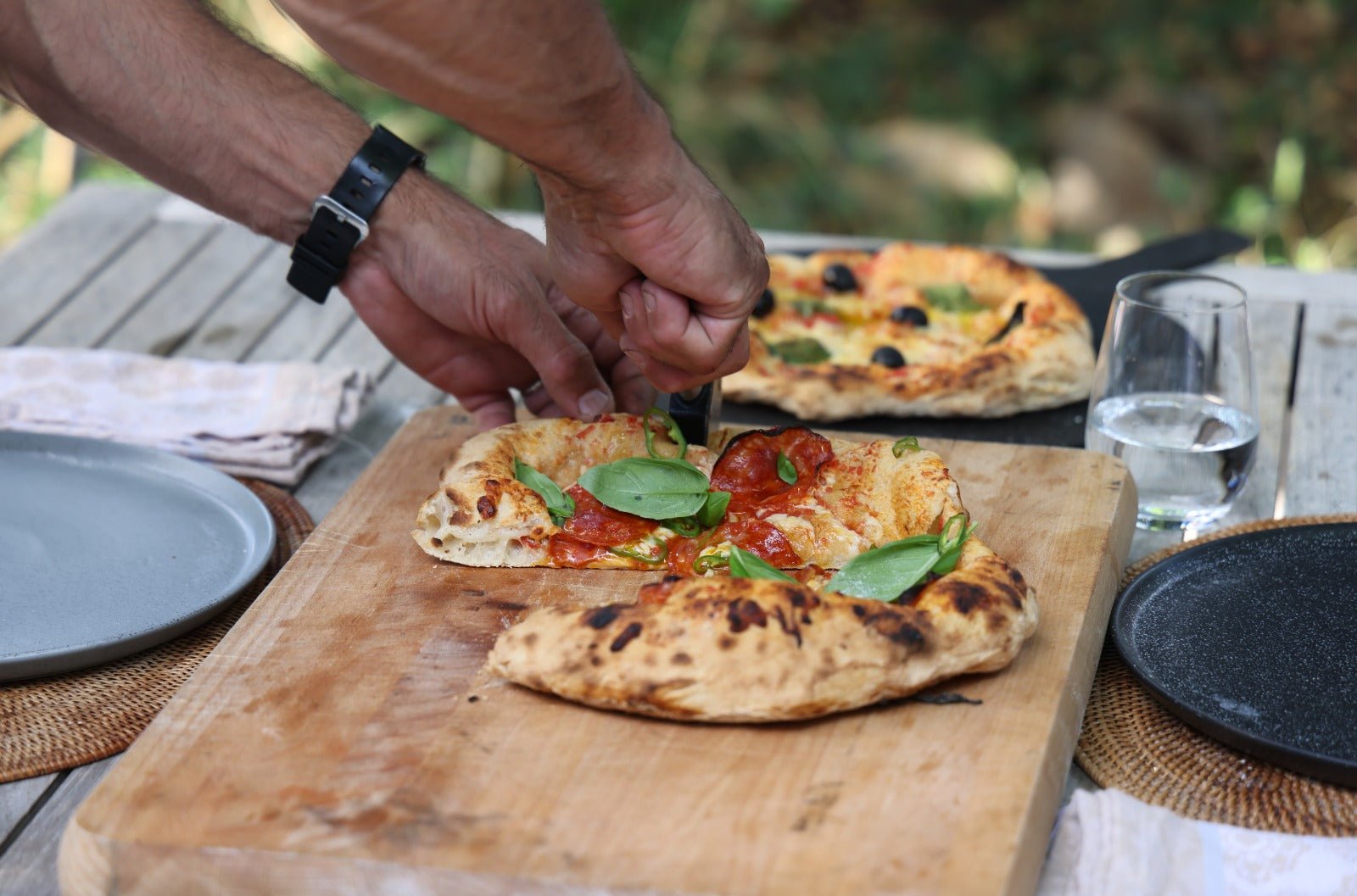 Load video: Baking pizzas in the Charlie Charcoal oven